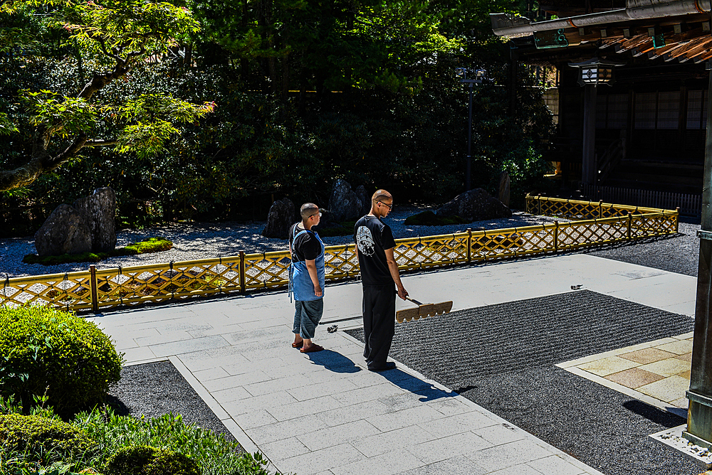 Monks working on Zen Garden at Yochi-in temple in Koyasan (Mount K?ya), a huge temple settlement in Wakayama Prefecture to the south of Osaka