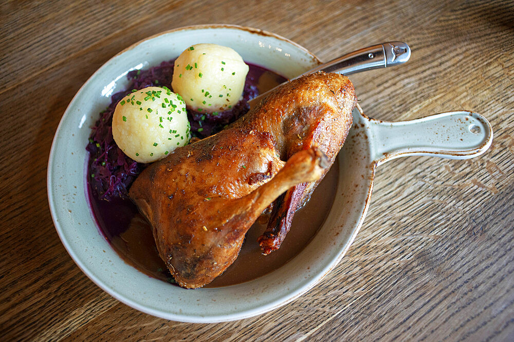 Chicken with potatoes and beetroot. Typical dish of Tyrolean cuisine. Fischerh√§usl Restaurant on 8 Herrengasse Street. Innsbruck Tyrol Austria