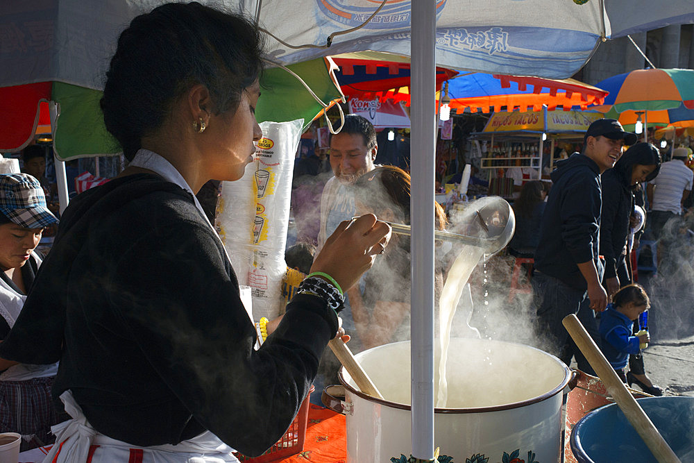 Malted milk woman seller in America Central Park, Quetzaltenango city Guatemala.