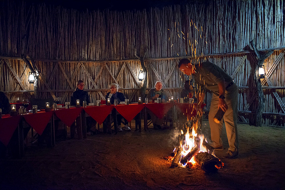 Night dinner wiht fire at Mala Mala Game Reserve Sabi Sand Park Kruger South Africa, Africa