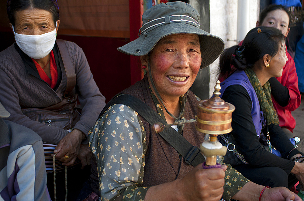 Tsepak Lhakhang Monastery. Lhasa Tibet China. Outside of Ramoche Temple. The women make a procession around the temple to ask the god of longevity Cherisi chepal to have a good delivery, or old people to pray to him.