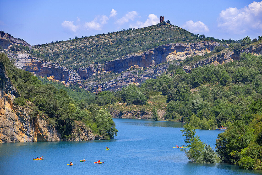 Congost de Mont-Rebei in the Pre-Pyrenees of Lleida, Catalonia. Serra del Montsec, La Noguera, Lleida, Spain

The Montrebei Gorge (in Catalan Congost de Mont-Rebei) is a place that is located between the provinces of Huesca and Lv©rida (Spain), between the regions of Ribagorza and Pallars JussvÜ. It is constituted in the narrowest part by which the Noguera Ribagorzana river, which constitutes the natural border between Aragon and Catalonia, crosses the Montsec mountain range, walls in vertical fall of more than 500 meters and a width at its minimum point of 20 meters . The Catalan part is part of the Noguera Nature Reserve. It is within the Sierra del Montsec Natural Interest Area.