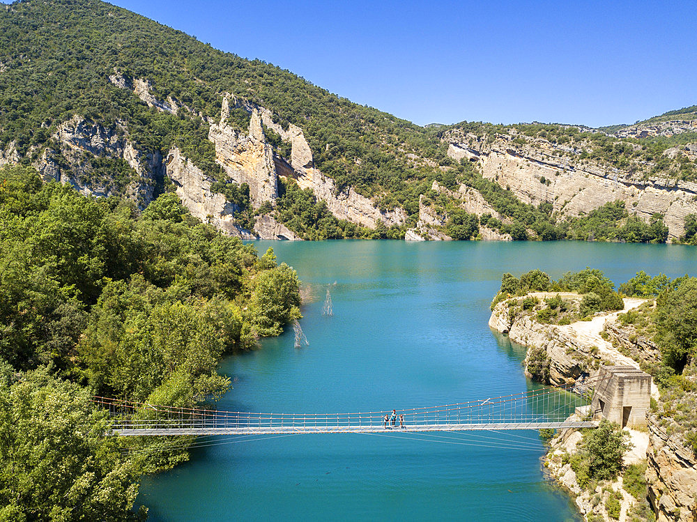 Congost de Mont-Rebei in the Pre-Pyrenees of Lleida, Catalonia. Serra del Montsec, La Noguera, Lleida, Spain

The Montrebei Gorge (in Catalan Congost de Mont-Rebei) is a place that is located between the provinces of Huesca and Lv©rida (Spain), between the regions of Ribagorza and Pallars JussvÜ. It is constituted in the narrowest part by which the Noguera Ribagorzana river, which constitutes the natural border between Aragon and Catalonia, crosses the Montsec mountain range, walls in vertical fall of more than 500 meters and a width at its minimum point of 20 meters . The Catalan part is part of the Noguera Nature Reserve. It is within the Sierra del Montsec Natural Interest Area.