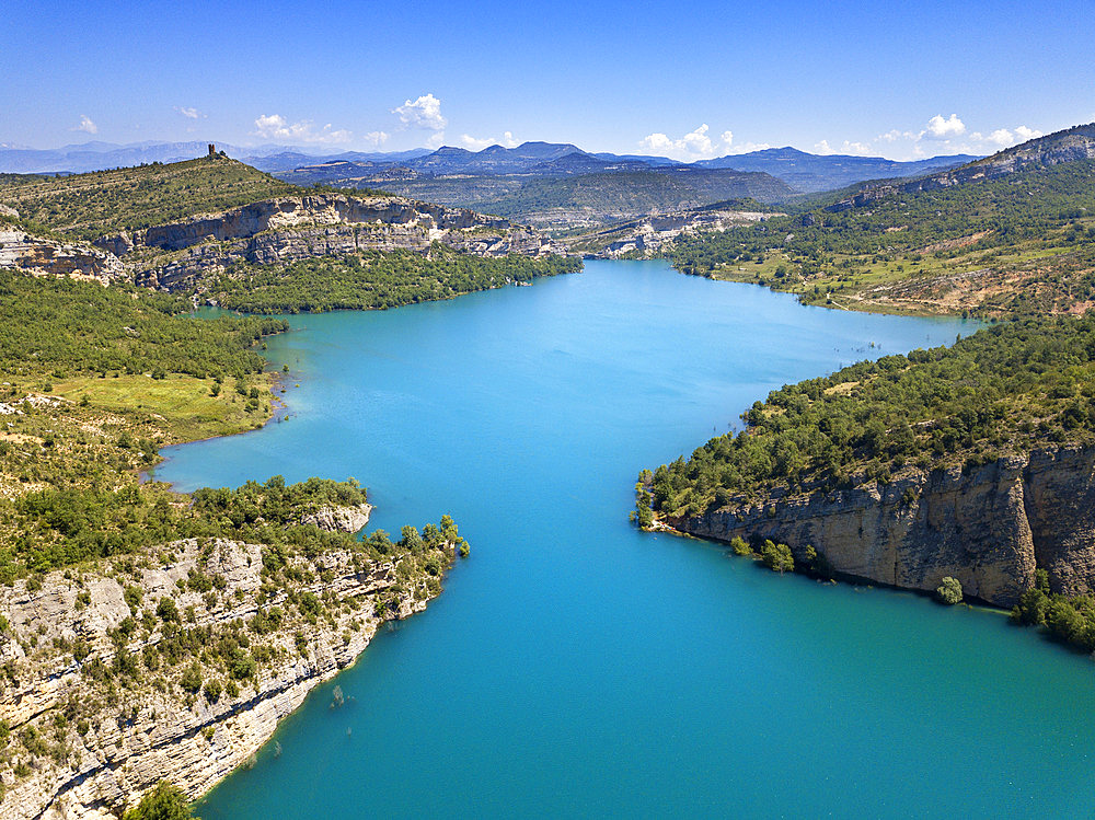 Congost de Mont-Rebei in the Pre-Pyrenees of Lleida, Catalonia. Serra del Montsec, La Noguera, Lleida, Spain

The Montrebei Gorge (in Catalan Congost de Mont-Rebei) is a place that is located between the provinces of Huesca and Lv©rida (Spain), between the regions of Ribagorza and Pallars JussvÜ. It is constituted in the narrowest part by which the Noguera Ribagorzana river, which constitutes the natural border between Aragon and Catalonia, crosses the Montsec mountain range, walls in vertical fall of more than 500 meters and a width at its minimum point of 20 meters . The Catalan part is part of the Noguera Nature Reserve. It is within the Sierra del Montsec Natural Interest Area.