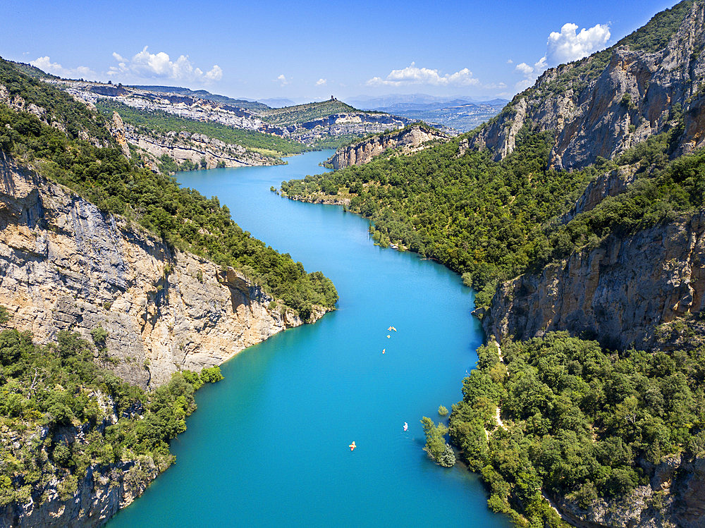 Congost de Mont-Rebei in the Pre-Pyrenees of Lleida, Catalonia. Serra del Montsec, La Noguera, Lleida, Spain

The Montrebei Gorge (in Catalan Congost de Mont-Rebei) is a place that is located between the provinces of Huesca and Lv©rida (Spain), between the regions of Ribagorza and Pallars JussvÜ. It is constituted in the narrowest part by which the Noguera Ribagorzana river, which constitutes the natural border between Aragon and Catalonia, crosses the Montsec mountain range, walls in vertical fall of more than 500 meters and a width at its minimum point of 20 meters . The Catalan part is part of the Noguera Nature Reserve. It is within the Sierra del Montsec Natural Interest Area.