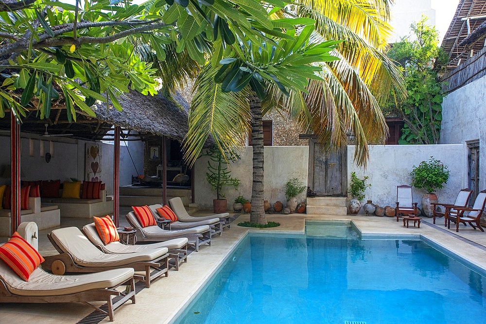 The Pool And Long Chairs In Lamu Patio House Hotel, Lamu, Kenya