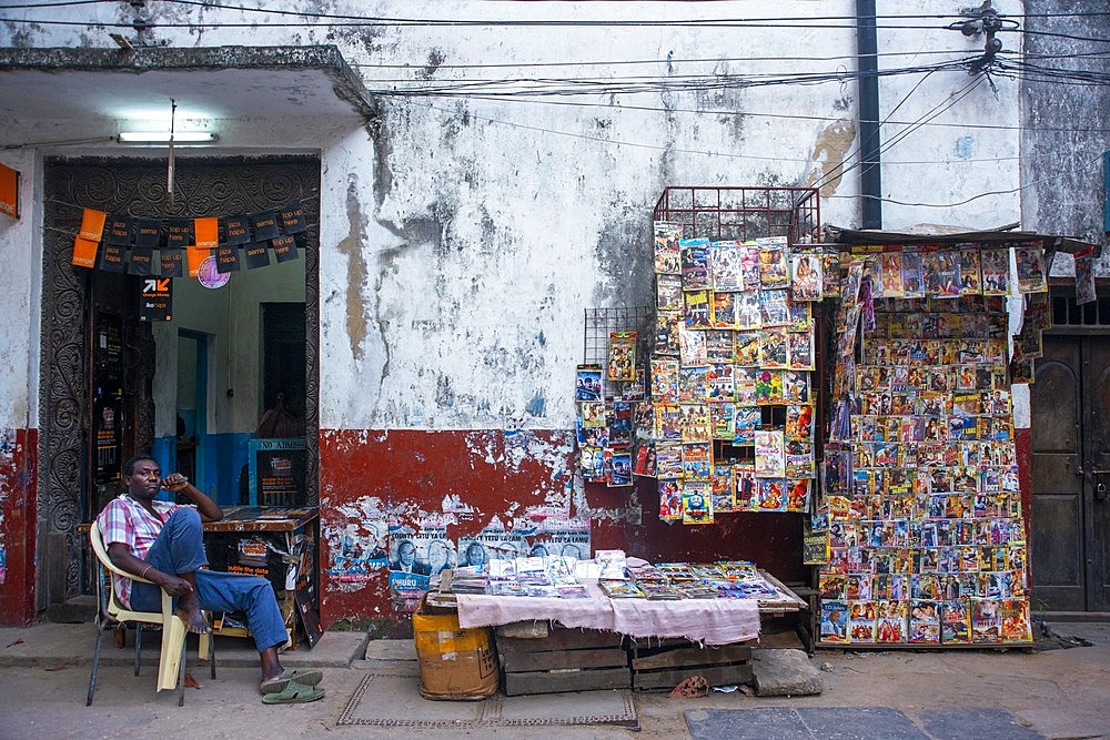 Magazine shop stall in a narrow street of Lamu town in Lamu Island, Kenya.