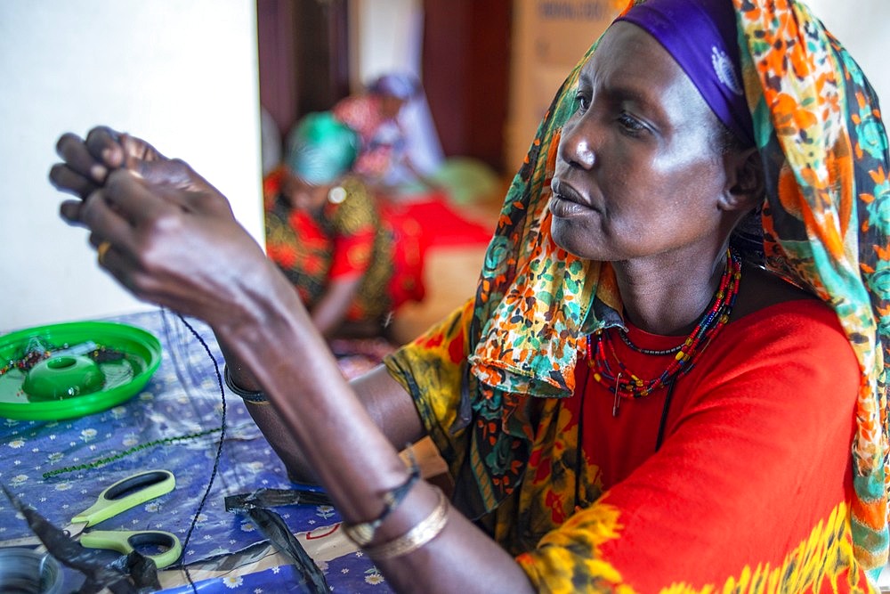 Sewing cloths to make souvenirs. Afrikable spanish NGO in Lamu island Kenya. This association tries to empower women who have been victims of abuse. By making souvenirs that are later sold in the village store and the schooling of their children.