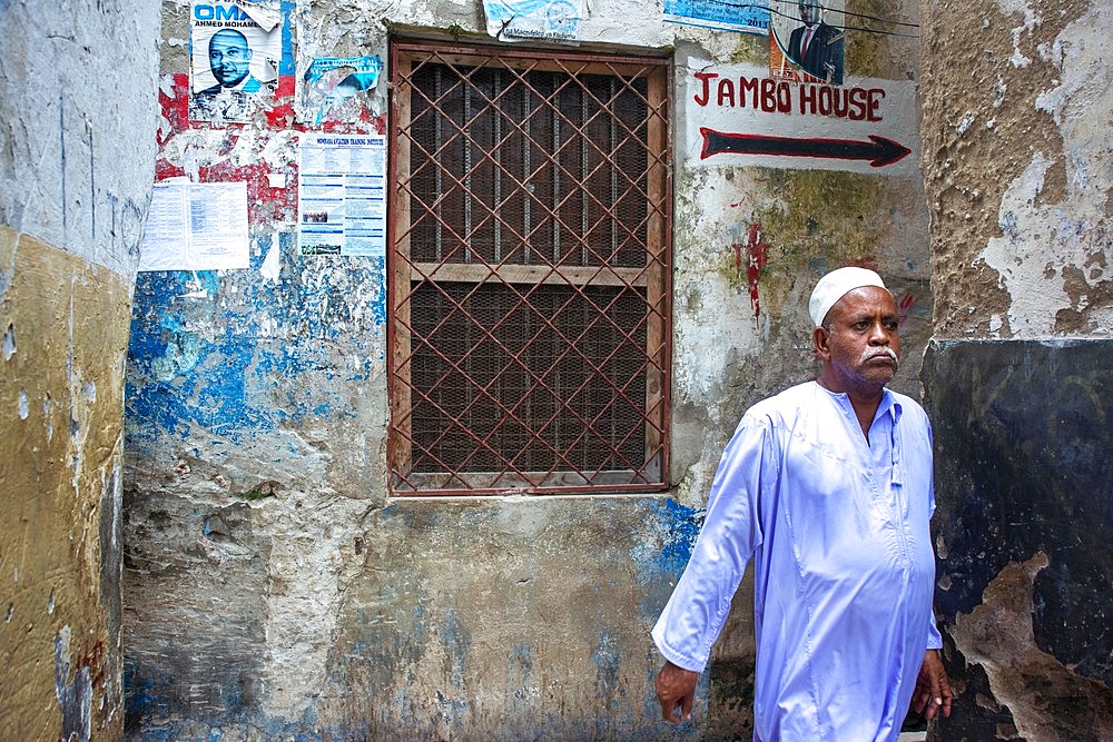 Local people in the narrow strees of the city town of Lamu island in Kenya