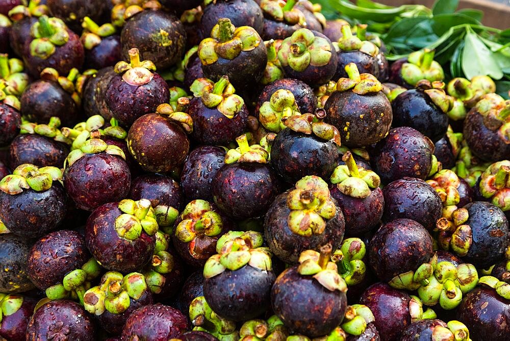 Mangosteen fruit for sale on the street in Guilin, China.