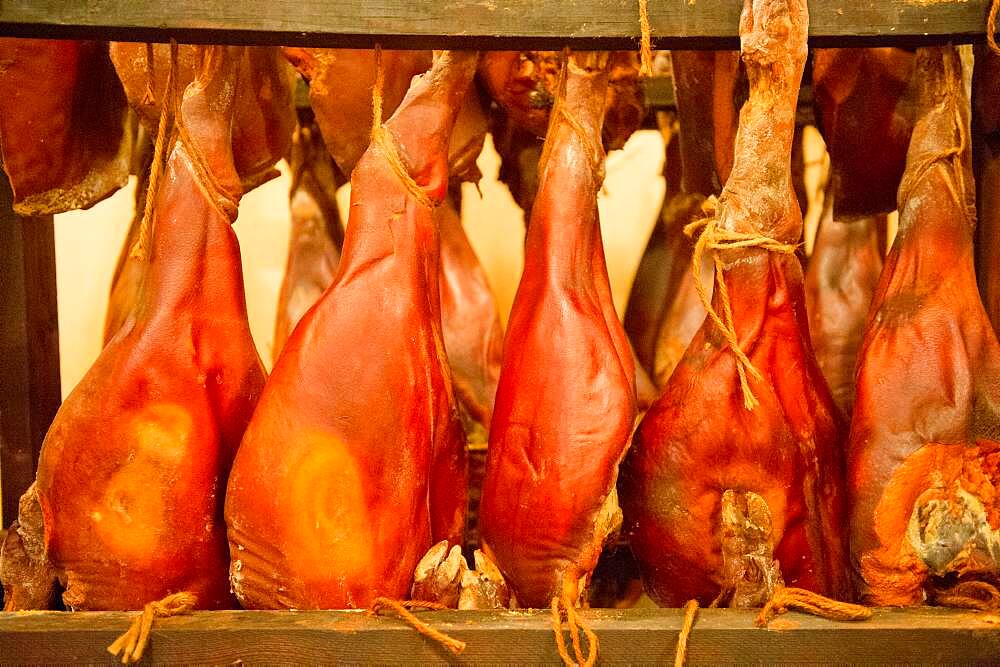 Salt cured hams hanging