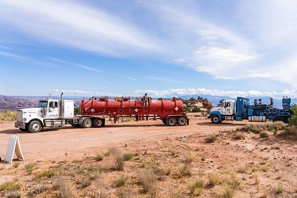 An acid tanker and pumper truck for acidizing an oil well to restore production. Utah.