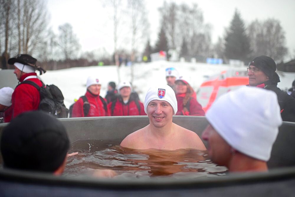 Swimmers recover in warm pool during Winter Swimming World Championships 2014 in Rovaniemi, Finland