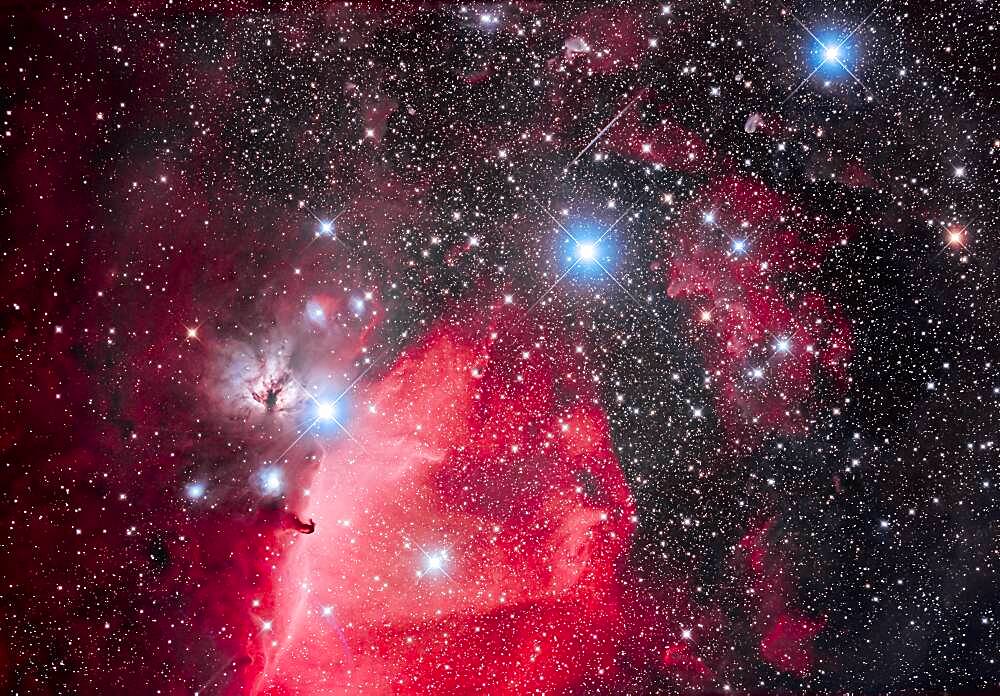 This is the Belt of Orion with its three blue stars across the top of the frame (L to R: Alnitak, Alnilam, and Mintaka), with the iconic Horsehead Nebula (aka B33) below Alnitak, with the dark Horsehead set against the bright nebula IC 434, aka Orion's Dagger. The pinkish nebula above Alnitak is NGC 2024, the Flame Nebula. The small blue reflection nebula left of the Horsehead is NGC 2023, with smaller IC 435 to the left of it. The field is filled with the large open cluster Collinder 70. The multiple star at bottom left of centre is Sigma Orionis. Many other smaller bits of reflection nebulas populate the field in and around the Belt.