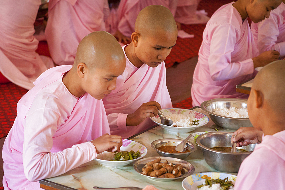 Nuns eating their meals, Sakyadhita Thilashin Nunnery School, Sagaing, near Mandalay, Myanmar, (Burma)