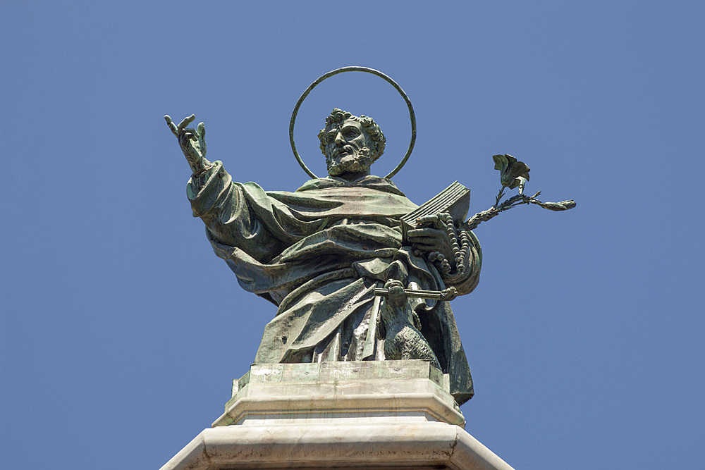 Statue of San Domenico, St Dominic, on obelisk, Piazza San Domenico Maggiore, Naples, Campania, Italy