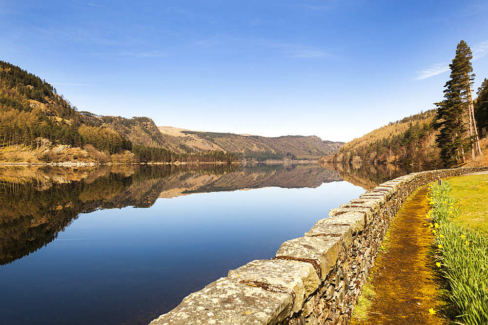 Lakeland hills reflecting on the still water of Thirlmere Reservoir, Lake District National Park, Cumbria, England