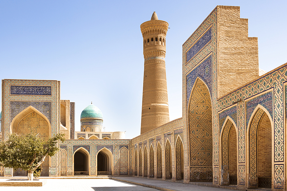 Kalon Mosque courtyard, also known as Kalyan Mosque, Kalon Minaret and Mir I Arab Madrasah behind, Bukhara, Uzbekistan