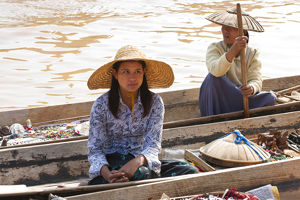 Women selling merchandise in a floating market, Ywama village, Inle Lake, Shan State, Myanmar, (Burma)