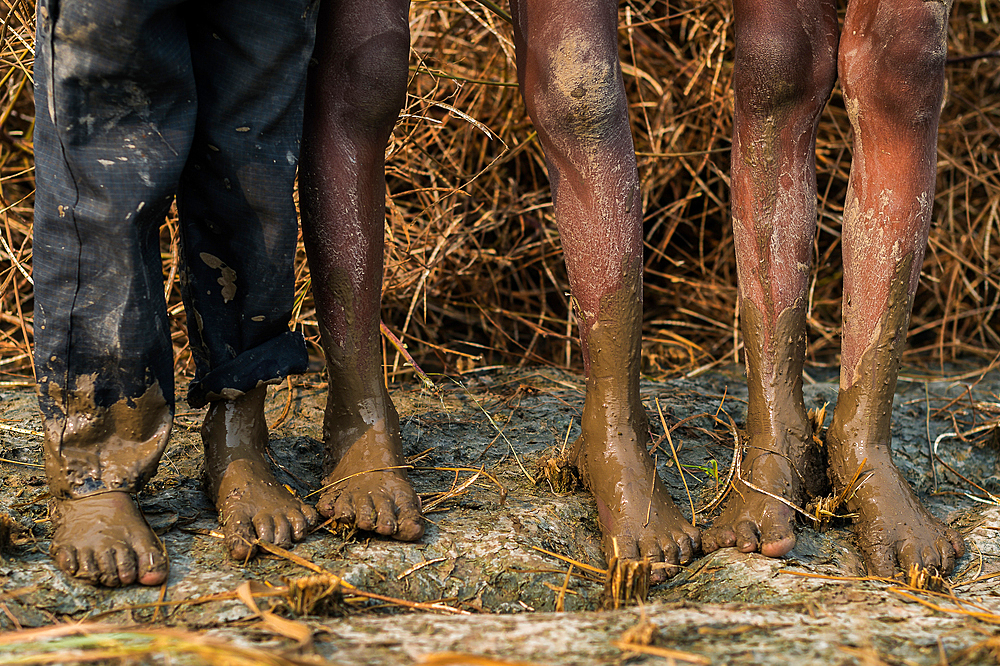 Brothers playing in the wheat field,