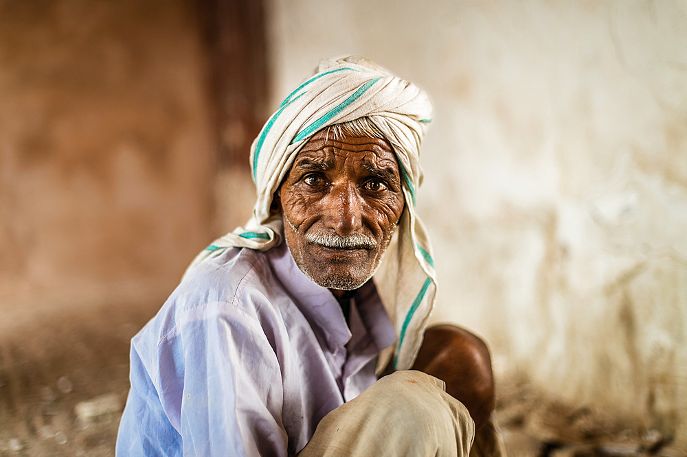 An old men working in the Red Fort