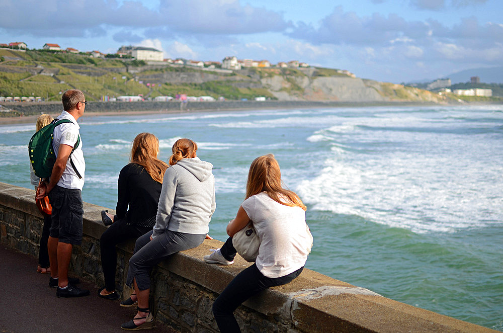 Girls watching Cote des Basques beach, Biarritz