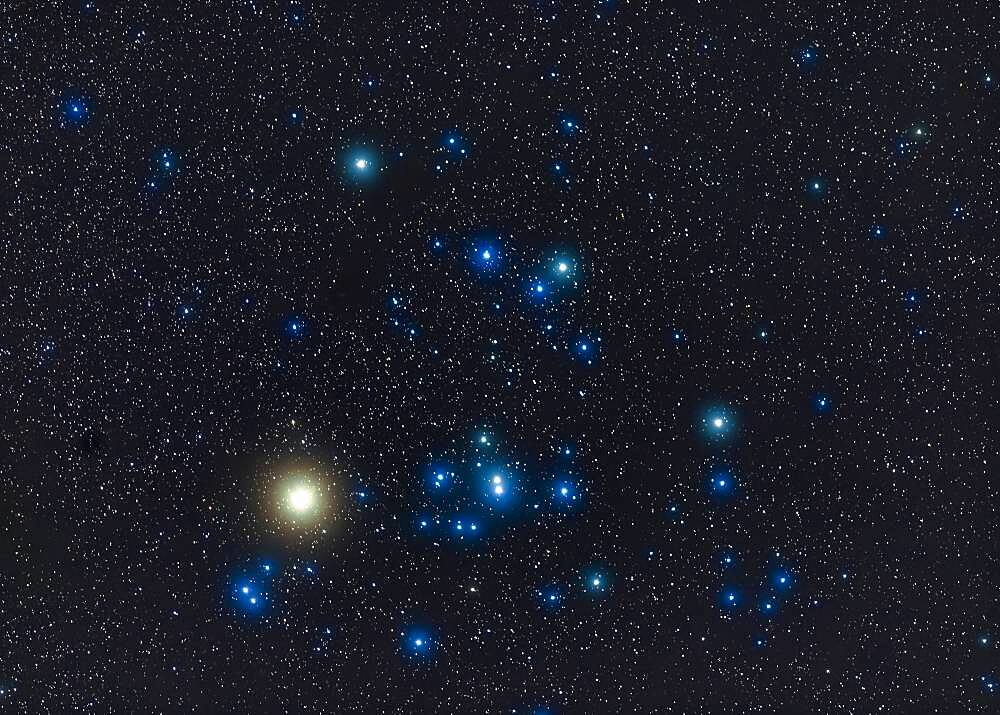 The Hyades star cluster with the red giant star Aldebaran (looking yellow here) in Taurus the bull in the winter sky. The field is similar to what a pair of large binoculars would show. I shot this from home Nov. 25, 2019.