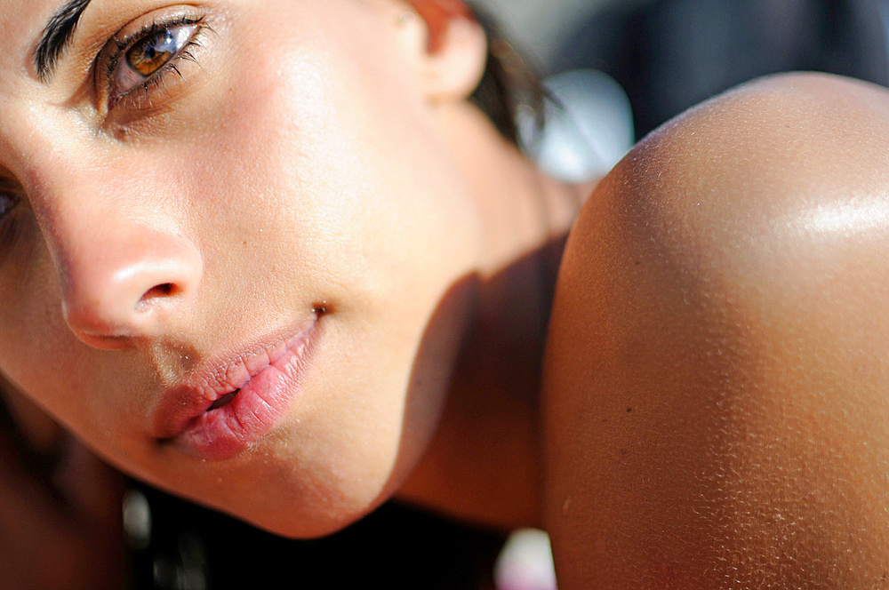 Young attractive woman on the beach