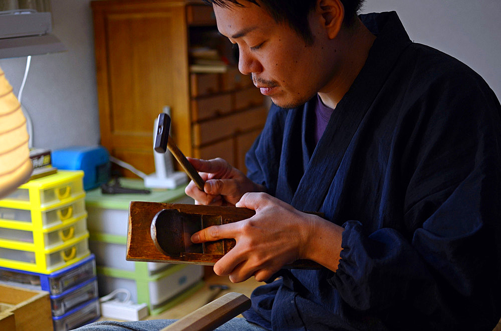 Japanese Sword Scabbard (Koshirae) Maker, Atsuhiro Morii, working at his workshop. Yokohama, Japan