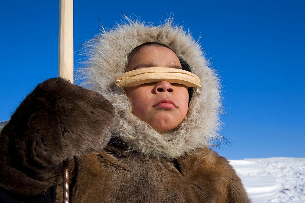 Portrait of young boy in Gojahaven, an Inuit settlement in the far north of Canada.