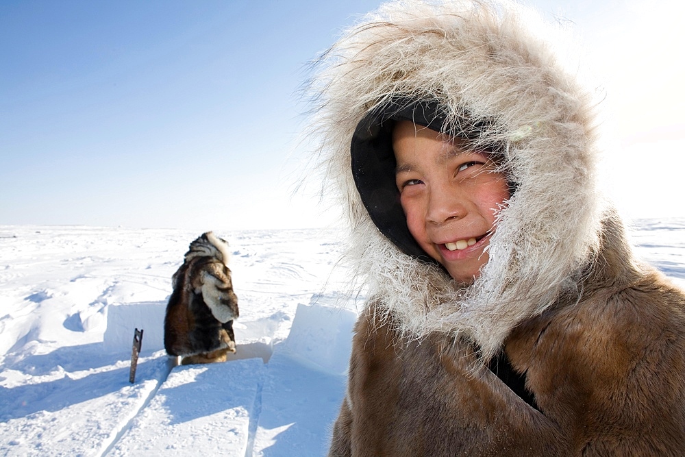 Portrait of young boy in Gojahaven, an Inuit settlement in the far north of Canada.