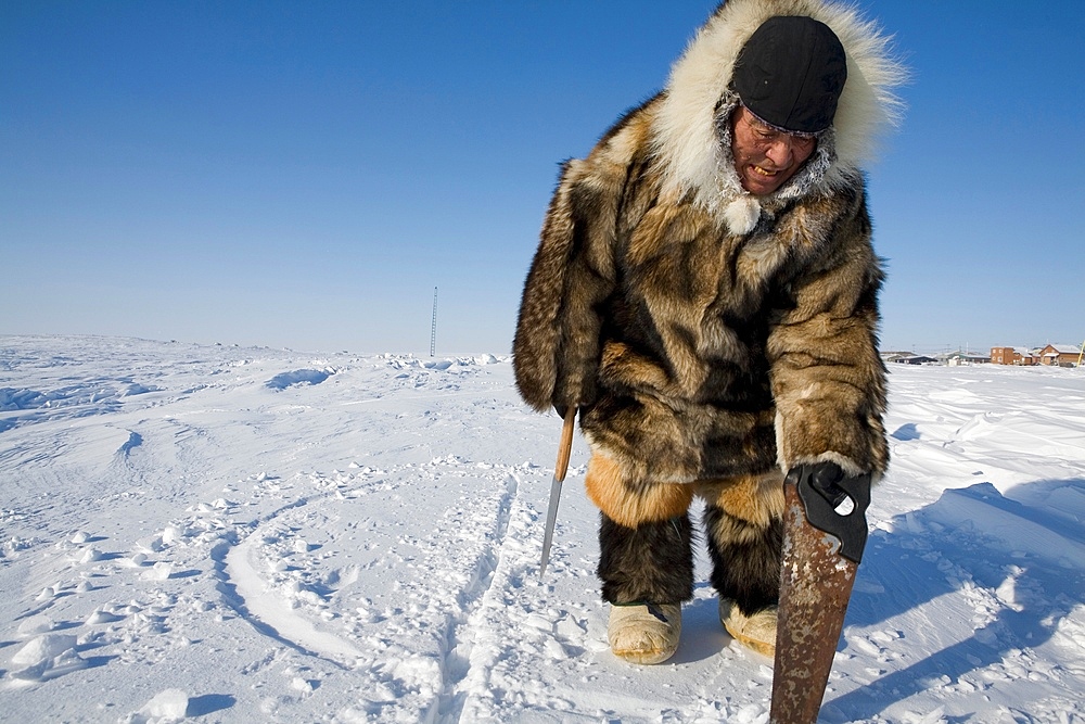 Building an igloo in Gojahaven, an Inuit settlement in the far north of Canada