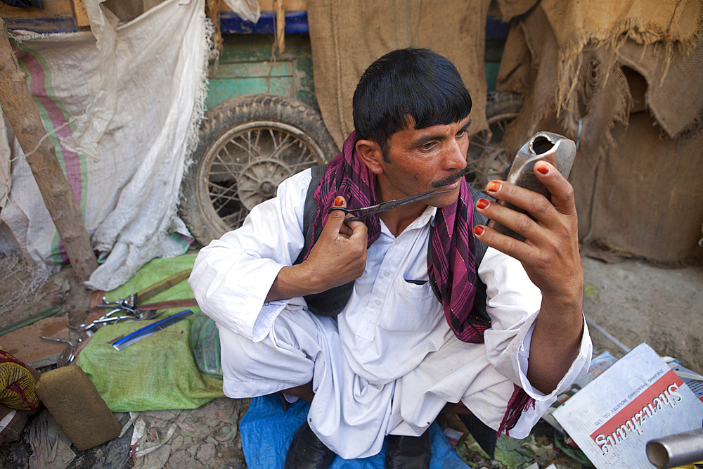 barber in downtown Kunduz city, Afghanistan