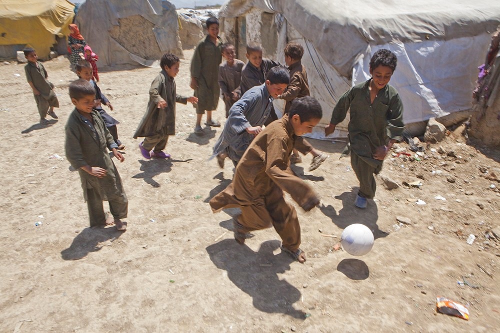 Afghan children playing in a  slum in Kabul