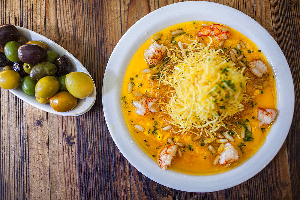 Carpaccio of eggs and shrimp with crispy potato,and olives, Bar Mut, Pau Claris 192, Barcelona, Spain