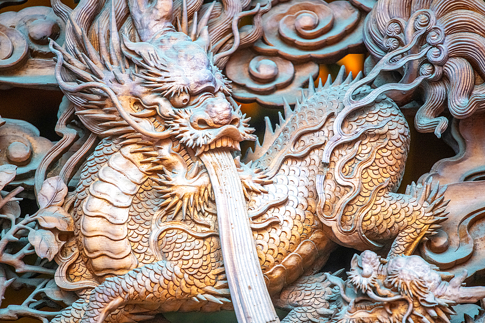 An intricate dragon statue resting at Jing'an Temple, Shanghai, China