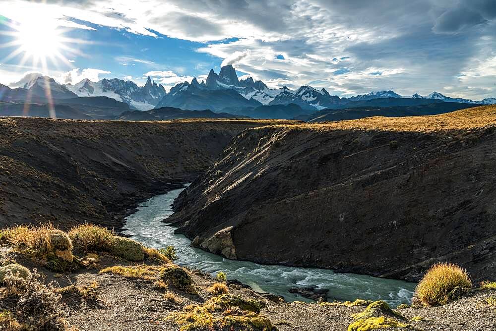 The Fitz Roy Massif at sunset, viewed over the canyon of the Rio de las Vueltas in Los Glaciares National Park near El Chalten, Argentina.  A UNESCO World Heritage Site in the Patagonia region of South America.