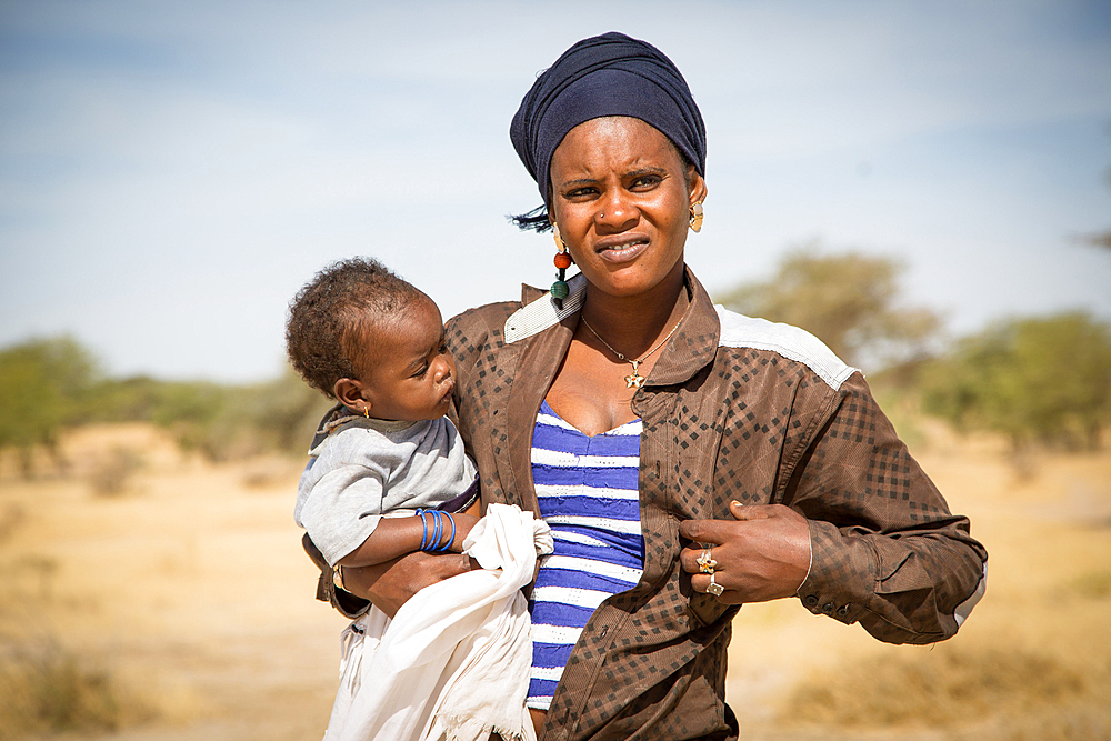 Senegalese woman and her child near Tilla village in northern Senegal