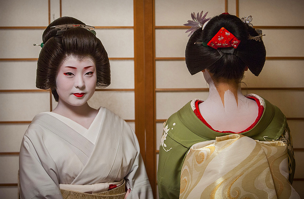 Fukuyu,geisha and Fukukimi,'maiko' (geisha apprentice). from Ishihatsu okiya (geisha house).Geisha's distric of Miyagawacho.Kyoto. Kansai, Japan.