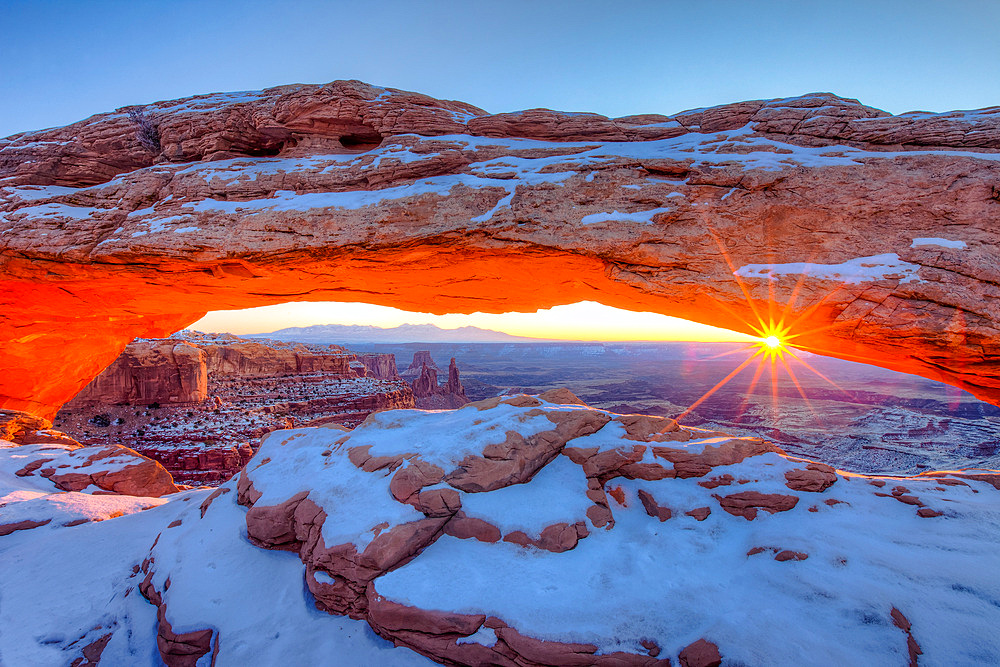 Washer Woman Arch & Monster Tower thru Mesa Arch in winter in the Island in the Sky District of Canyonlands NP, Utah.