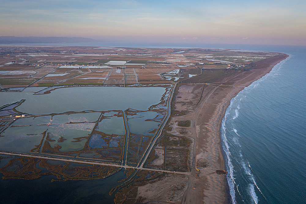 Aerial view of marshes, the Tancada lagoon, rice fields, Eucaliptos beach and lﾴAlfaca beach; Sant Carles de la Rapita, Ebro Delta, Natural Park, Tarragona, Spain