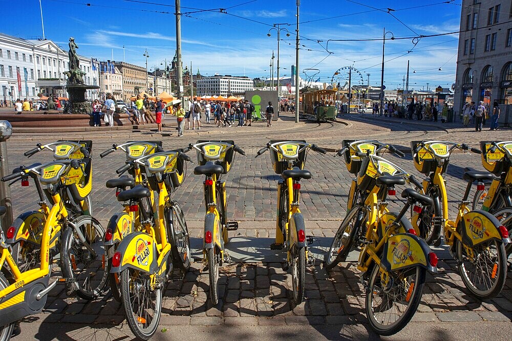 Helsinki cycling Finland, view of bikes for rent in the Helsinki City Cycle Scheme parked closely together in Kauppatori (Market Square), Finland