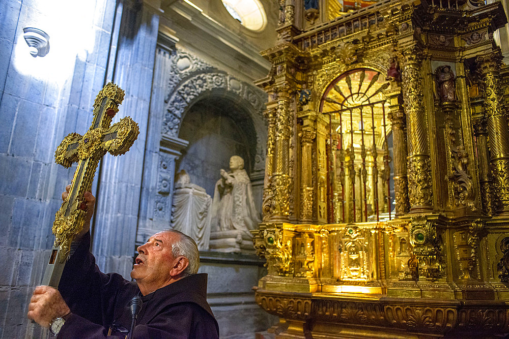 A monk at the monastery Santo Toribio in northern Spain gets out the holy relic, said to be part of the cross on which Jesus died Inside Santo Toribio de Liebana monastery. Liébana region, Picos de Europa, Cantabria Spain, Europe