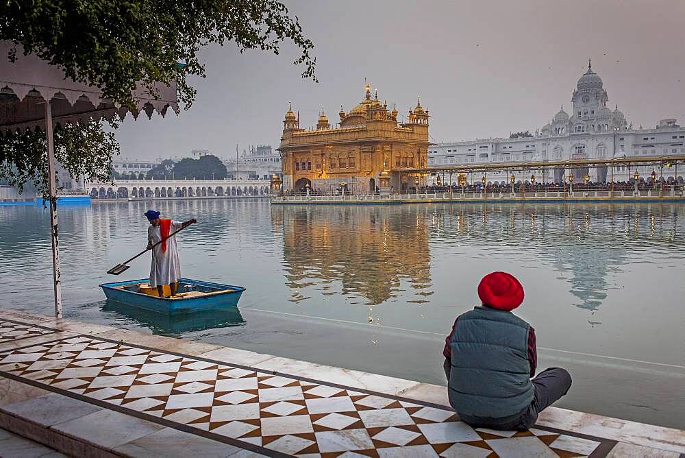 pilgrims and sacred pool Amrit Sarovar, Golden temple, Amritsar, Punjab, India