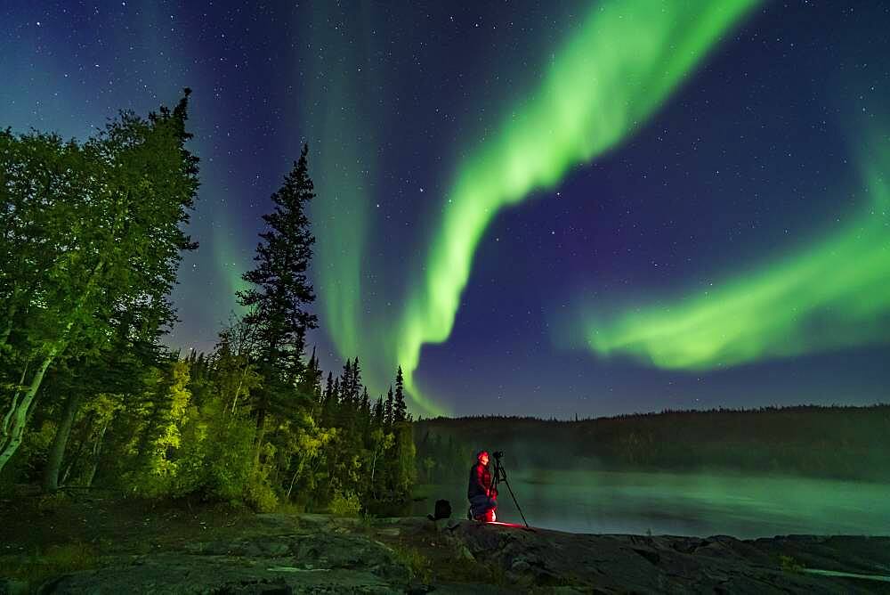 Photographer Stephen Bedingfield is shooting the Northern Lights at the Ramparts waterfalls on the Cameron River, September 8, 2019. The Big Dipper is at centre. The aspen trees are nicely turning colour.