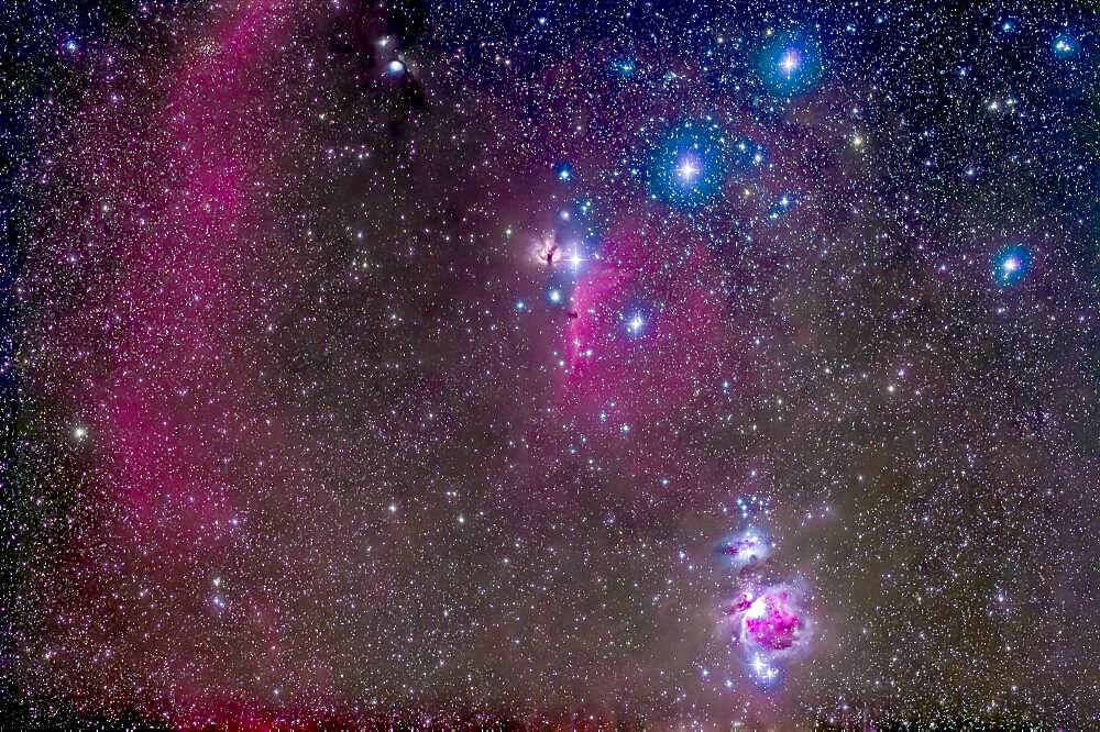 The Belt and Sword region of Orion, with the Orion Nebula, Messiesr 42 and 43, at bottom. Below the left star of the Belt, Alnitak, is the famous Horsehead Nebula, while above it is NGC 2024, aka the Flame Nebula. At very top left is Messier 78, while part of Barnard's Loop arc across the field at left. The field is filled with other faint red emission and blue reflection nebulas. The large loose open cluster Collinder 70 surrounds the middle star of the Belt, Alnilam.