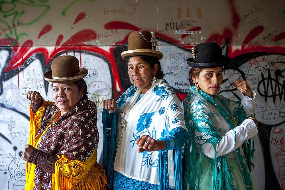 At left Angela la Folclorista , in the middle Dina, and at right Benita la Intocable, cholitas females wrestlers, El Alto, La Paz, Bolivia