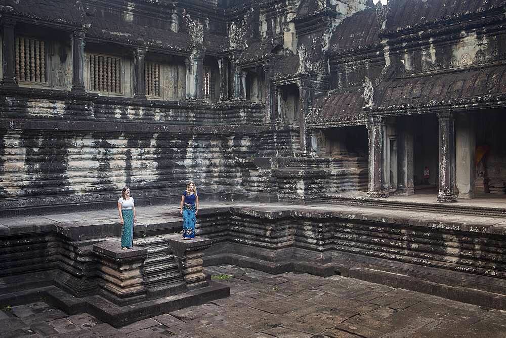 Tourists, inside Angkor Wat, Siem Reap, Cambodia