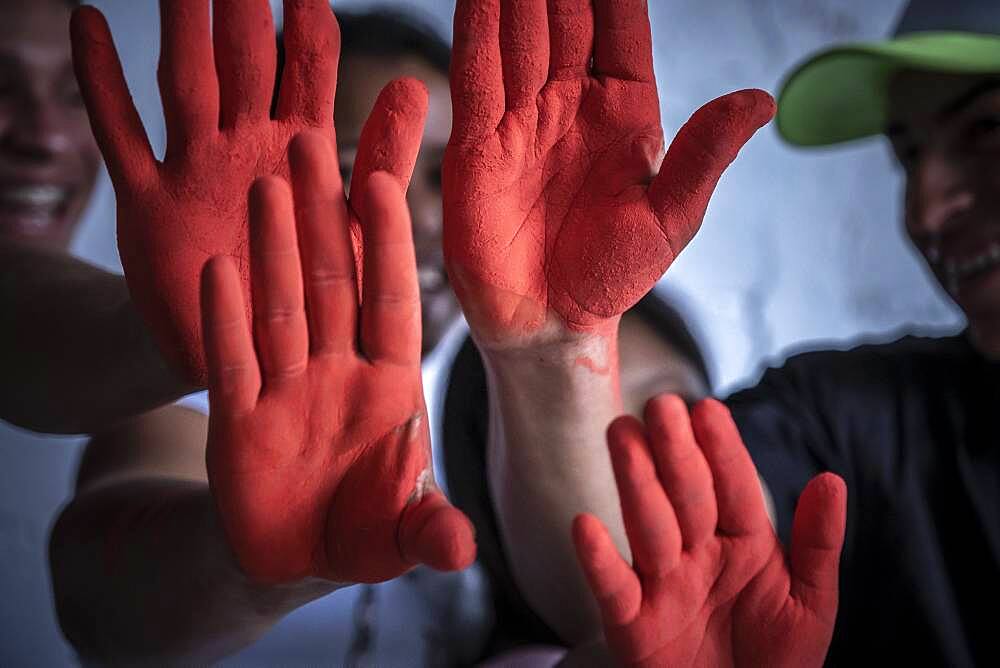 Teenagers who were child soldier during their childhood that belonged to armed groups of the Colombian conflict. The international day against the child soldier is known worldwide also as the day of the red hand, colombia