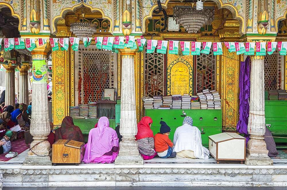 Praying, in Hazrat Nizamuddin Dargah, Delhi, India